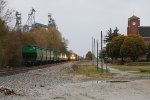 Passing a cut of TPW interchange cars in the siding, Q642 comes north on the old Monon